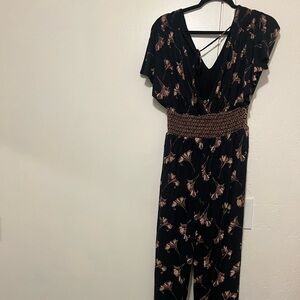 Black floral jumpsuit from Anthropologie